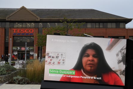 A Greenpeace protest outside Tesco headquarters, featuring a video of Brazil indigenous leader Sônia Guajajara talking about the devastating Amazon fires.