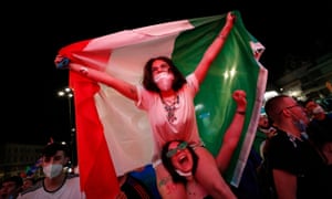 Italy fans celebrate after Italy’s Ciro Immobile scored their second goal.