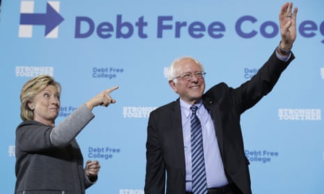 Hillary Clinton and Bernie Sanders acknowledge the audience at a campaign stop in September 2016.