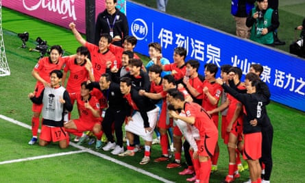 South Korea players celebrate after beating Australia 2-1 in February’s Asian Cup.