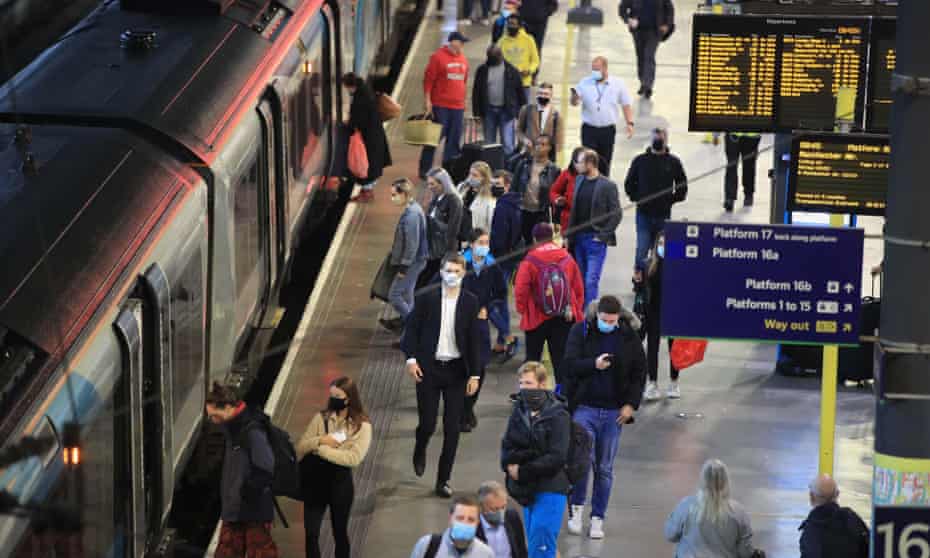 Passengers on the platform at Leeds railway station.
