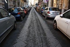 Ash from the eruption covers a street in Catania