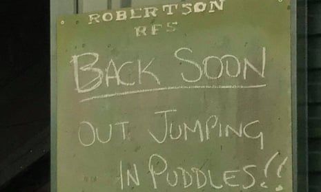 Sign Robertson RFS saying: Out jumping puddles