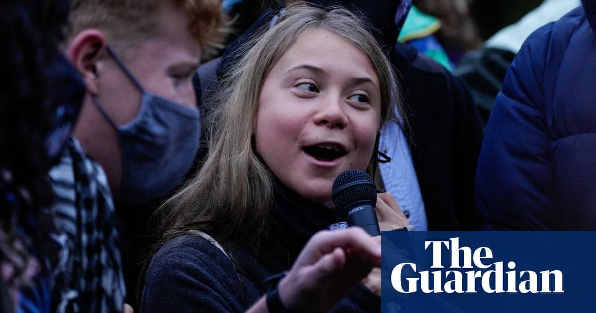 ‘You can shove your climate crisis up your arse’: Greta Thunberg sings at Cop26 – video