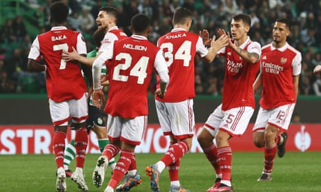 Arsenal's players celebrate after Sporting's Hidemasa Morita scored an equalising own goal
