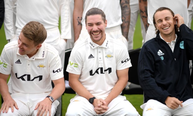 Rory Burns, flanked by Sam Curran (left) and Tom Curran (right) at Surrey’s pre-season photocall