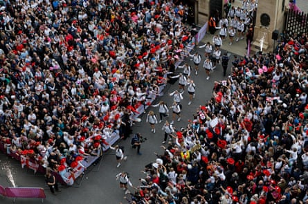 England players are greeted by a large crowd outside Twickenham stadium before the Women’s Rugby World Cup final against Canada.