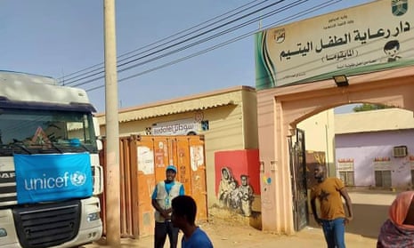 A truck carrying humanitarian assistance from Unicef stands in front of the orphanage in Khartoum.