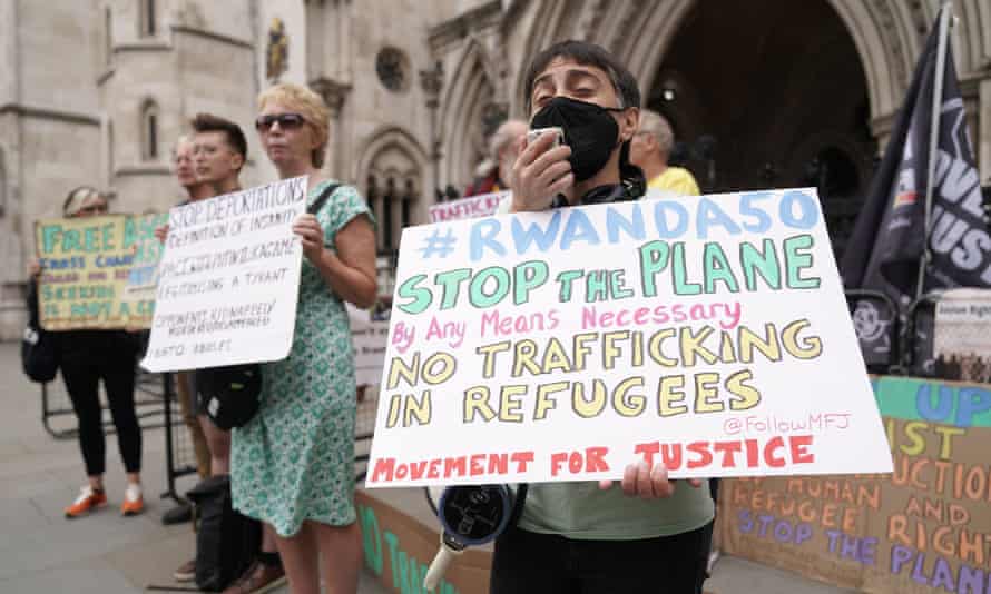 Protesters outside the high court in London where there has been a fresh legal attempt to stop asylum seekers being flown to Rwanda tomorrow under the government’s policy.