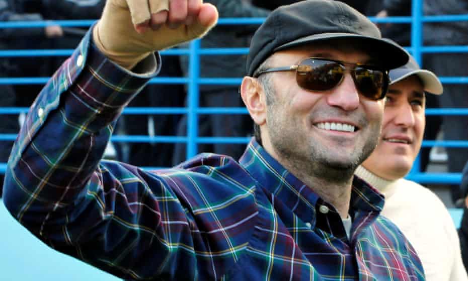 Suleiman Kerimov watches a soccer match in Makhachkala, Russia, in December 2012.