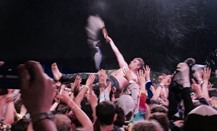 Mac DeMarco crowdsurfs during his gig at Glastonbury, 2016