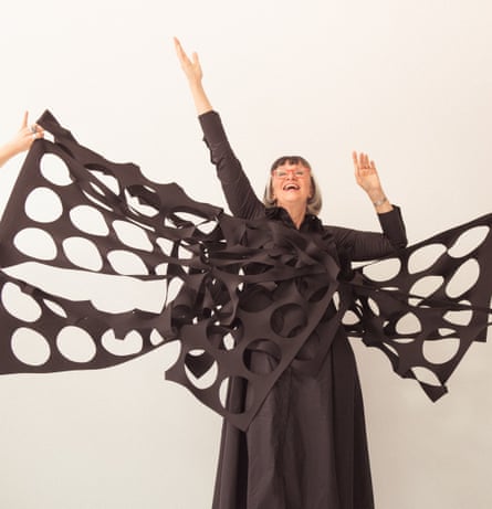Philippa Perry wears sculptural art dress by a-jane.com, maxi shirt dress by karenmillen.com and her own spectacles.