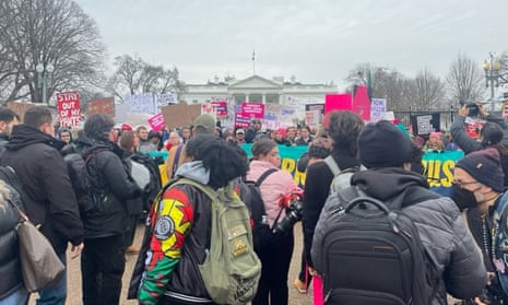 Protestors stand outside the White House in DC for the women’s march, on the 50th anniversary of Roe vs Wade.