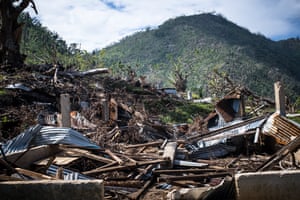 Melsisi remains covered in wreckage and debris.