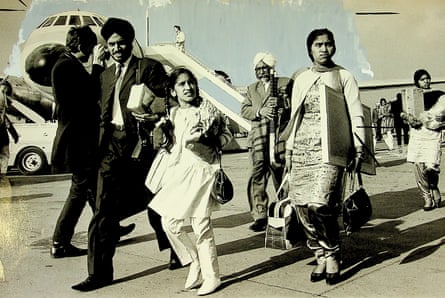 Asians from Kenya arriving at Gatwick, 1968. Caption reads: “Gatwick Airport, London, a morning scattered with frost, sun, fog and lamentations. The reception lounge is filling up with white turbans, neatly trimmed mustaches, faint beards, vey well-pressed suits fashionably devoid of turnups. More than 100 Asians from Kenya - Britsh citizens - are due to arrive and their relatives and friends already in England have turned out to meet them...”