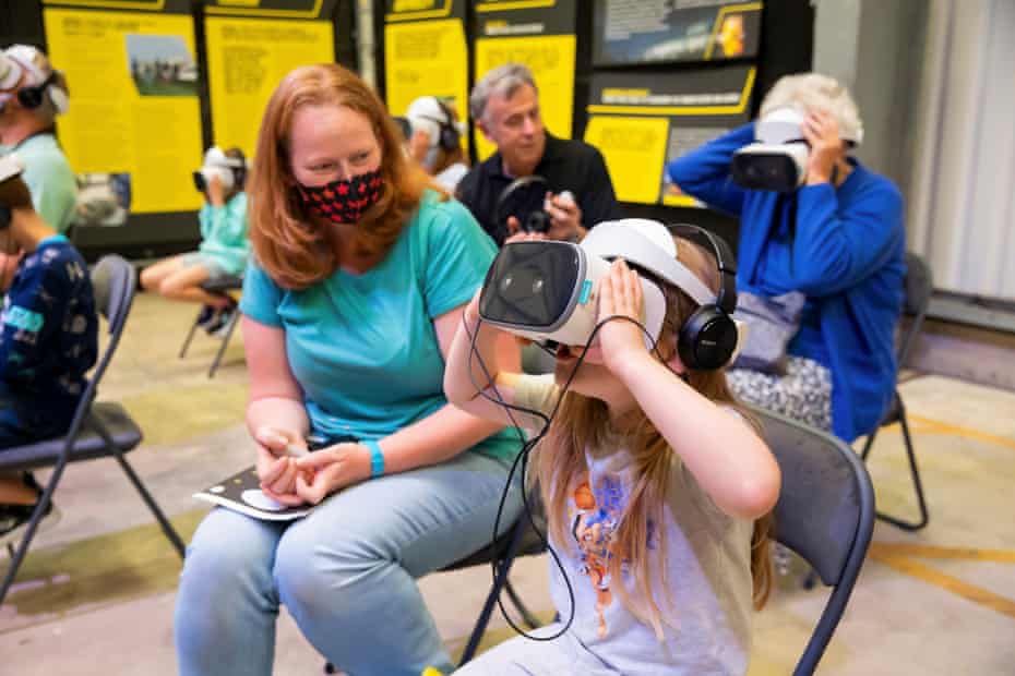 Destiny Whetter, 7, enjoying the VR experience alongside her mum Lucy.