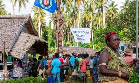 People queue to vote at a polling station in the capital Buka in an historical independence vote on November 25, 2019 in a vote that could create the world’s newest nation.
