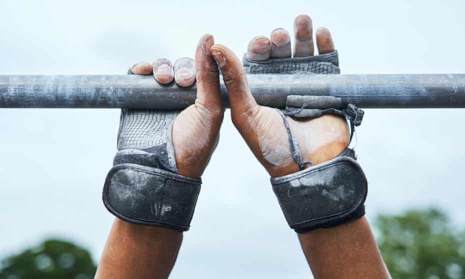 Get a grip: worn gloves covered in chalk help the athletes perform their moves on the bars.