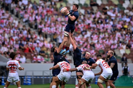 Tom Curry wins a lineout during the match.