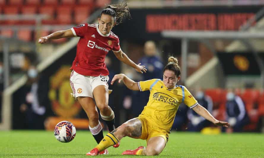 Manchester United’s Lucy Staniforth is tackled by Reading’s Rachel Rowe.