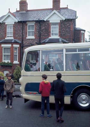 The bus carrying the Brazil squad, including Pelé  (third from left) leaves Bolton Wanderers’ Bromwich Street training ground on 8 July 1966