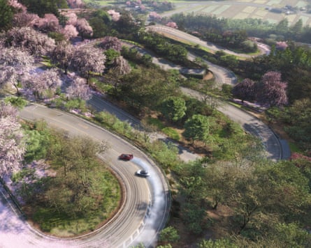 Screenshot from Forza Horizon 6 showing a bird’s-eye view of a winding racing track surrounded by trees of a green and pink hue
