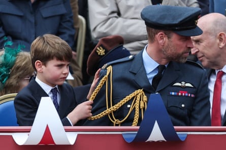 Prince Louis tugging at the braid of the Prince of Wales’s uniform while attending the armed forces and veterans’ parade commemorating the 80th anniversary of Victory in Europe Day in London.