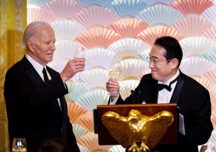 US President Joe Biden joins Japan prime minister Fumio Kishida in a toast at an official state dinner at the White House in Washington