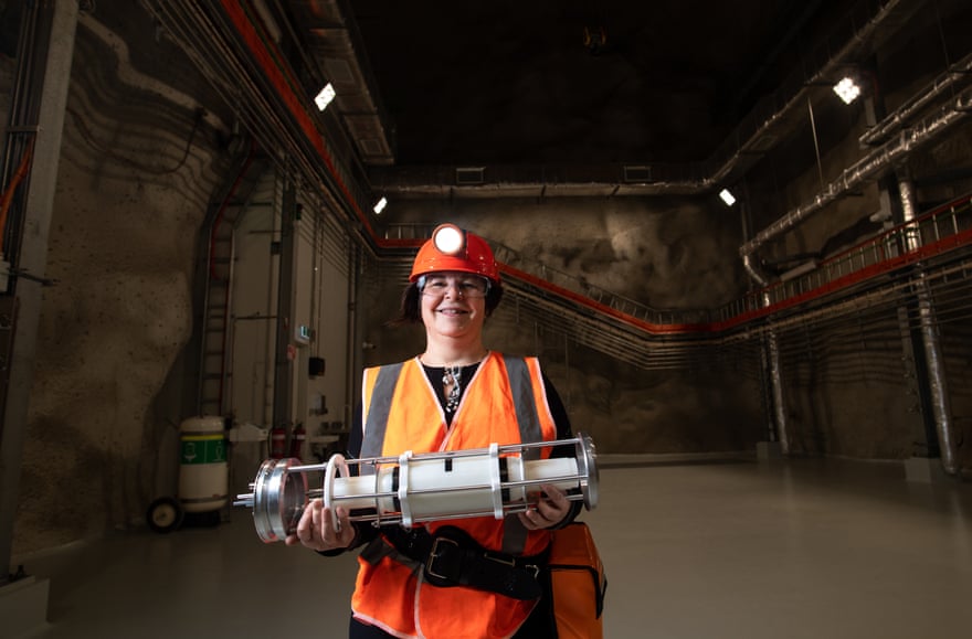 Prof Elisabetta Barberio in the Stawell Underground Physics Laboratory with a Sabre mock-up