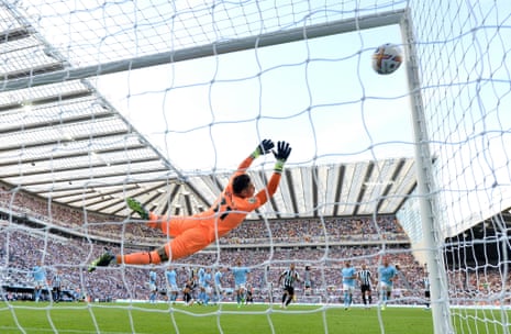 Newcastle’s Kieran Trippier scores a free kick to put his side 3-1 up against Manchester City at St James’ Park