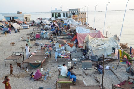 A view of makeshift tents of flood victims taking refuge on a higher ground.