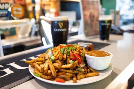 A spice bag and a pint of Guinness are the popular choices at Shea’s Irish bar.