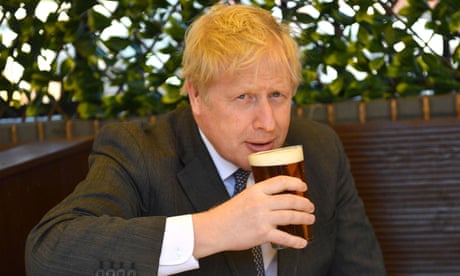 Boris Johnson with a pint of beer on the local election trail in April 2021.