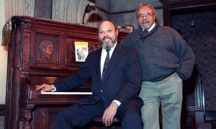 Wilson and director Lloyd Richards on the set of The Piano Lesson at the Walter Kerr Theatre in New York in 1990.