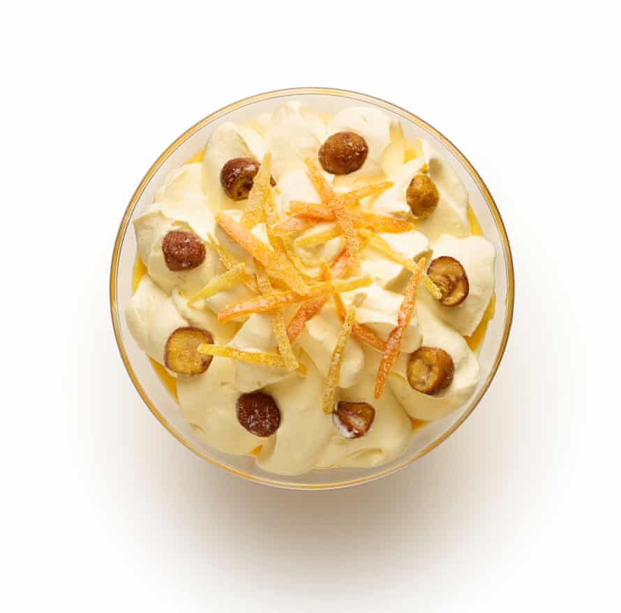 Felicity Cloake’s trifle stage 10. Arrange candied peel and nuts on top.