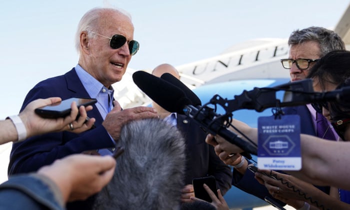 US president Joe Biden talks to reporters while boarding Air Force One on a trip to eastern Kentucky to visit families affected by devastation from recent flooding, as he departs from Delaware Air Guard Base in New Castle, Delaware, moments ago.