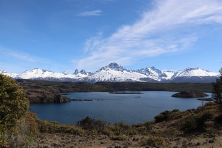 Snowcapped mountain peaks and a lake in the Cerro Castillo national park in Patagonia.