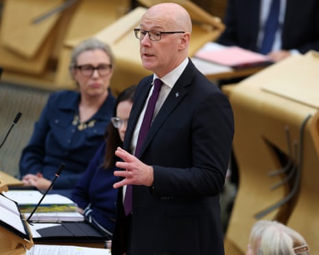 John Swinney speaks at FMQs earlier today.