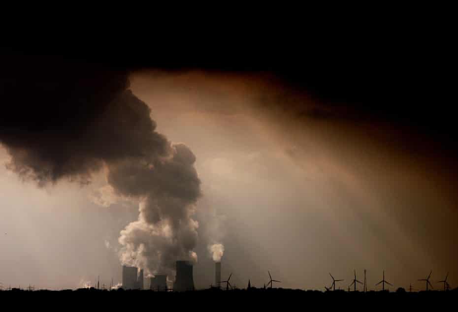 Steam and fumes billow from the brown coal-fired Niederaussem power plant near Bergheim, Germany