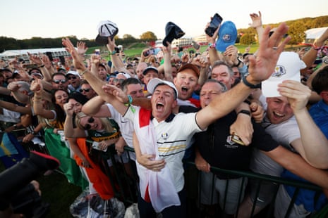 Rory McIlroy celebrates with fans after Team Europe’s 15-13 win over Team USA at the Ryder Cup.