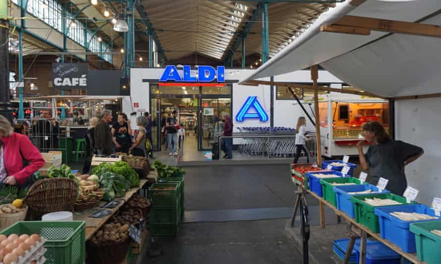 Aldi sits alongside boutique shops and artisanal food stalls in Markthalle Neun. The market’s owners say the supermarket’s departure was planned and discussed with residents from the beginning.