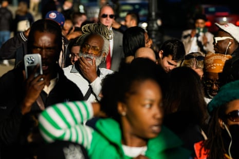 People wait outside to enter the Manhattan federal court for the sentencing of Sean "Diddy"