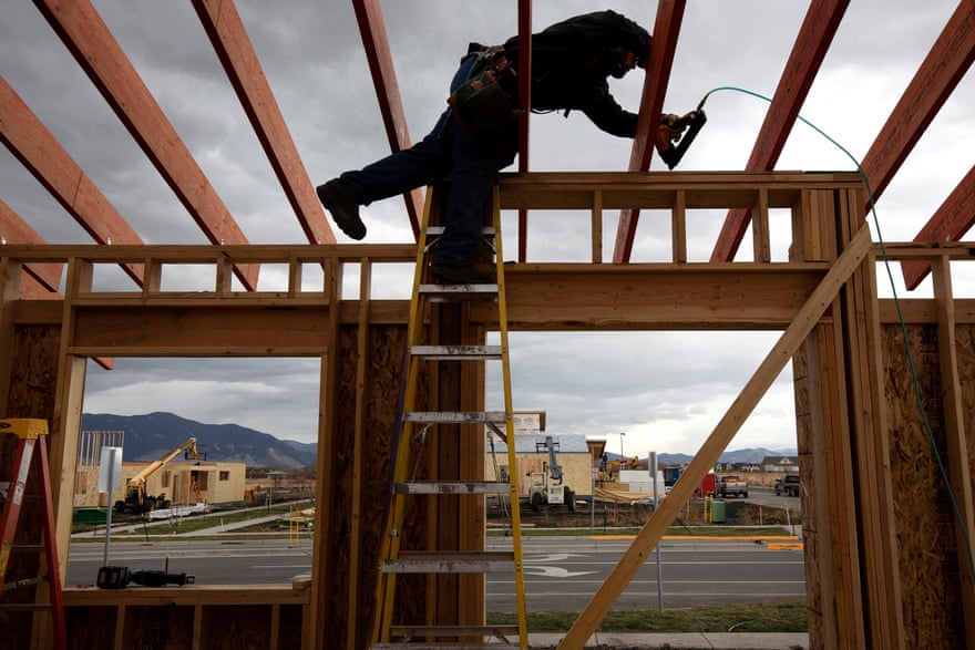 Construction worker Dan Reed works on a new house in the Lakes at Valley West, a new residential construction area in Bozeman.