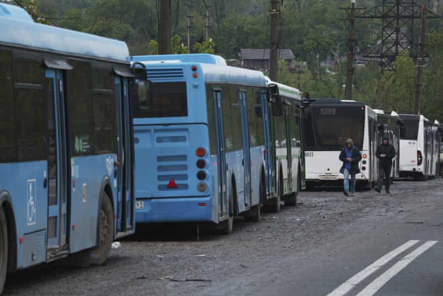 Buses wait for Ukrainian servicemen to transport them from Mariupol to a penal colony in Olyonivka last night.