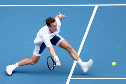 Jiri Lehecka crouches to play a shot