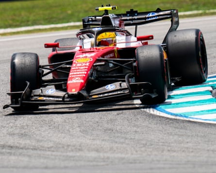 Lewis Hamilton grapples with his Ferrari