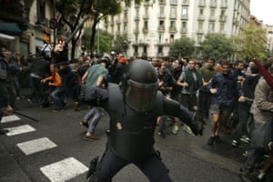 Spanish riot police use batons against would-be voters