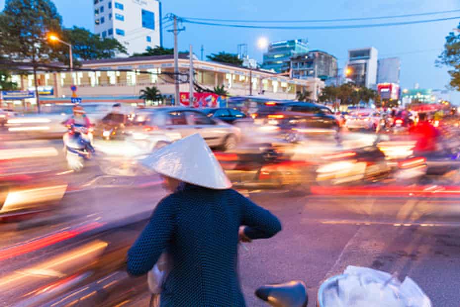 woman bicycle Vietnam traffic