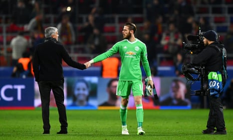 United boss Jose Mourinho shakes hands with keeper David De Gea.
