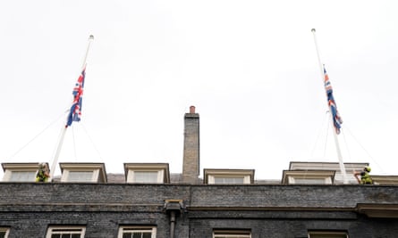 Union flags above Downing Street lowered to half-mast after the death of David Amess